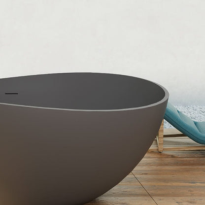 Stone resin wavy freestanding soaking tub edge detail